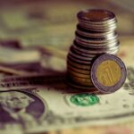 Caída de más de 60% en la Inversión Extranjera Directa que llegó a Puebla en 2025 encendió alertas por el impacto en la llegada de nuevos proyectos y en el dinamismo industrial del estado. FOTO: Canva.