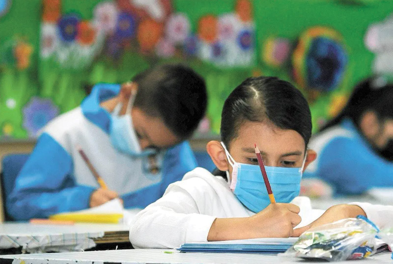 Escuelas de Puebla retoman medidas sanitarias como cubrebocas y desinfección de espacios ante casos de sarampión. FOTO: La Expresión.