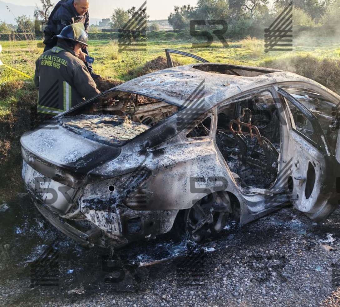 Localizan cuerpo dentro de un auto calcinado en Amozoc